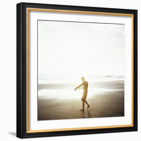 Young Man Waxes His Board Before Entering Marabella's Waves, Costa Rica, Central America-Aaron McCoy-Framed Photographic Print