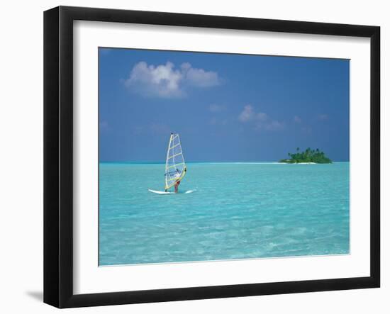 Young Man Windsurfing Near Tropical Island and Lagoon in the Maldives, Indian Ocean-Sakis Papadopoulos-Framed Photographic Print