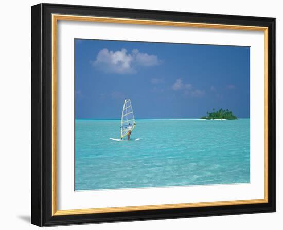 Young Man Windsurfing Near Tropical Island and Lagoon in the Maldives, Indian Ocean-Sakis Papadopoulos-Framed Photographic Print