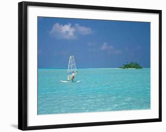 Young Man Windsurfing Near Tropical Island and Lagoon in the Maldives, Indian Ocean-Sakis Papadopoulos-Framed Photographic Print