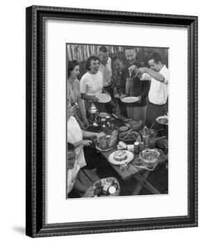 Young Married Couples Enjoying a Backyard Buffet Feast , Featuring Spaghetti-Nina Leen-Framed Photographic Print