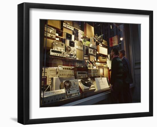 Young Men Men Look at a Window Display of Stereo and Recording Equipment, New York, NY, 1963-Yale Joel-Framed Photographic Print