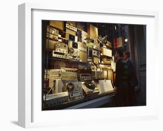 Young Men Men Look at a Window Display of Stereo and Recording Equipment, New York, NY, 1963-Yale Joel-Framed Photographic Print