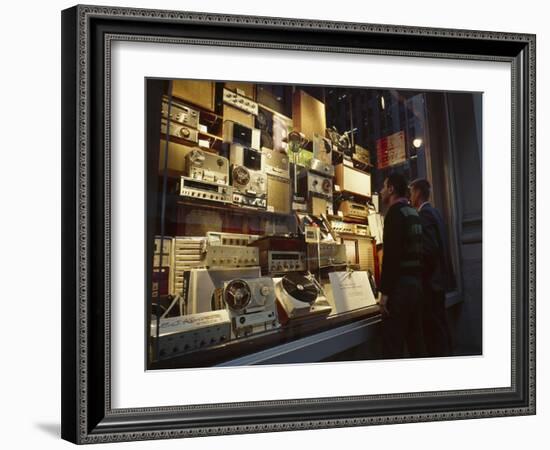 Young Men Men Look at a Window Display of Stereo and Recording Equipment, New York, NY, 1963-Yale Joel-Framed Photographic Print