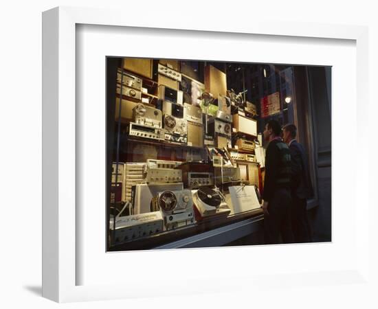 Young Men Men Look at a Window Display of Stereo and Recording Equipment, New York, NY, 1963-Yale Joel-Framed Photographic Print