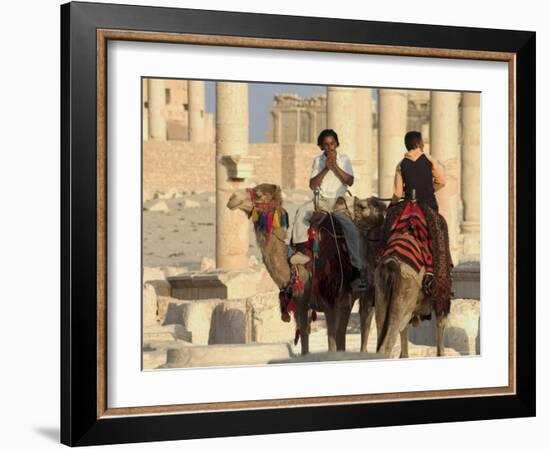 Young Men on Camels, Archaelogical Ruins, Palmyra, Unesco World Heritage Site, Syria, Middle East-Christian Kober-Framed Photographic Print