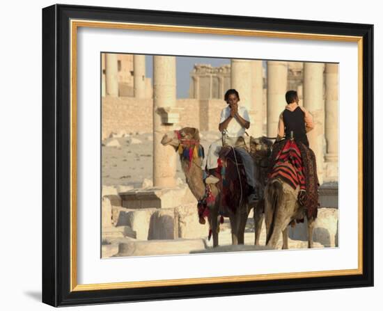 Young Men on Camels, Archaelogical Ruins, Palmyra, Unesco World Heritage Site, Syria, Middle East-Christian Kober-Framed Photographic Print