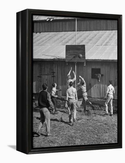 Young Men Playing Basketball with a Homemade Basket in a Farmyard-null-Framed Premier Image Canvas