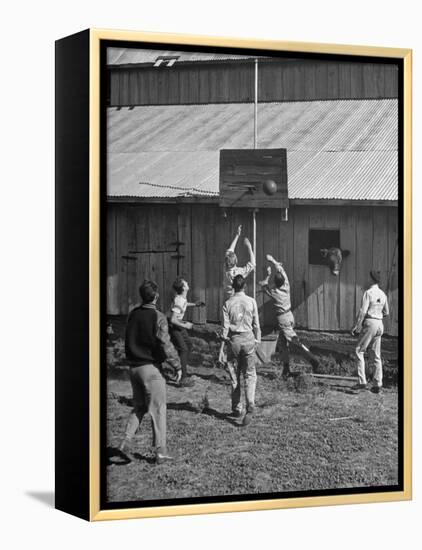 Young Men Playing Basketball with a Homemade Basket in a Farmyard-null-Framed Premier Image Canvas