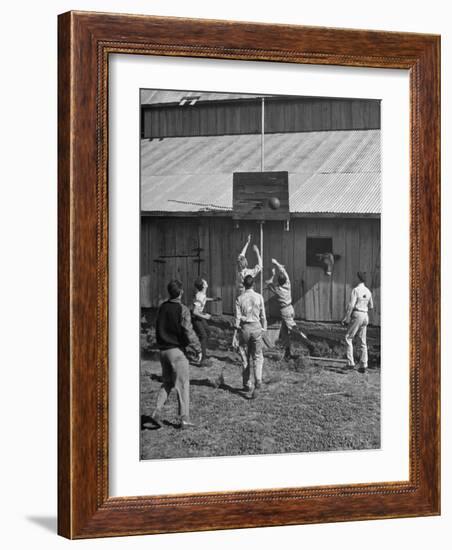 Young Men Playing Basketball with a Homemade Basket in a Farmyard-null-Framed Photographic Print