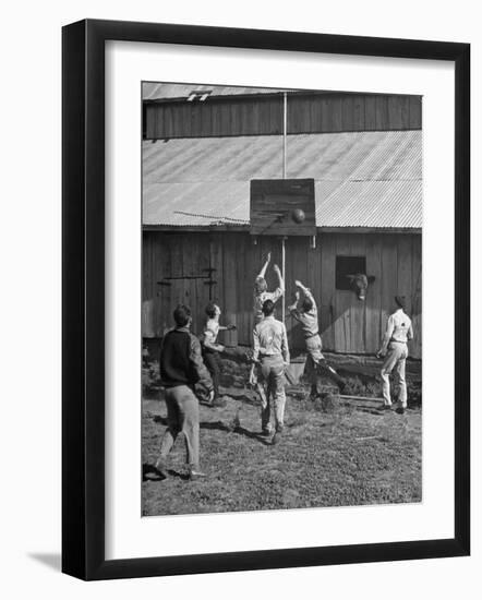 Young Men Playing Basketball with a Homemade Basket in a Farmyard-null-Framed Photographic Print