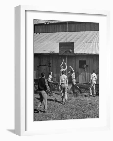 Young Men Playing Basketball with a Homemade Basket in a Farmyard-null-Framed Photographic Print