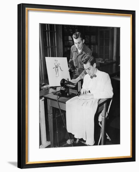 Young Men Using Sewing Machine-null-Framed Photo