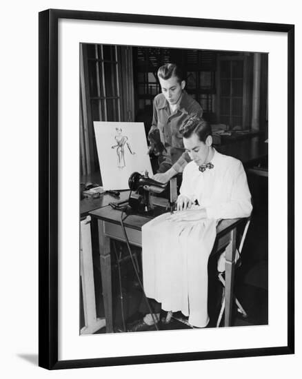 Young Men Using Sewing Machine-null-Framed Photo