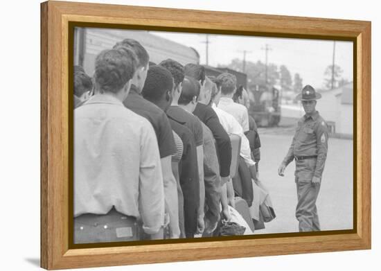 Young men who have been drafted wait in line to be processed into the US Army at Fort Jackson, SC-Warren K. Leffler-Framed Premier Image Canvas