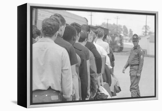 Young men who have been drafted wait in line to be processed into the US Army at Fort Jackson, SC-Warren K. Leffler-Framed Premier Image Canvas