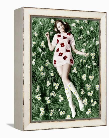 Young Model Biddy Lampard in the Grass Wearing a Short Dress (With Daisies) Inspired by Courreges-null-Framed Stretched Canvas