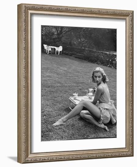 Young Model Wearing a Short, Striped Nightgown with Bottoms Attached Underneath-Nina Leen-Framed Photographic Print