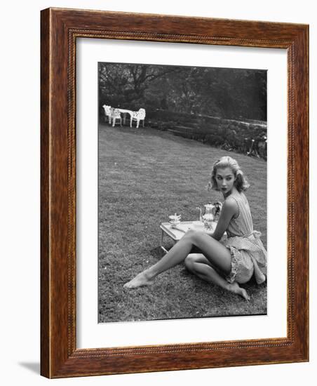 Young Model Wearing a Short, Striped Nightgown with Bottoms Attached Underneath-Nina Leen-Framed Photographic Print