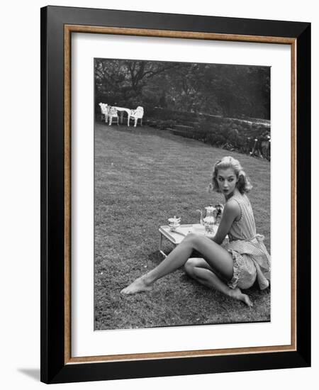 Young Model Wearing a Short, Striped Nightgown with Bottoms Attached Underneath-Nina Leen-Framed Photographic Print