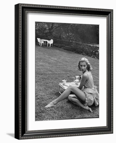 Young Model Wearing a Short, Striped Nightgown with Bottoms Attached Underneath-Nina Leen-Framed Photographic Print