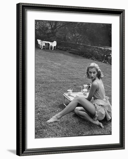 Young Model Wearing a Short, Striped Nightgown with Bottoms Attached Underneath-Nina Leen-Framed Photographic Print