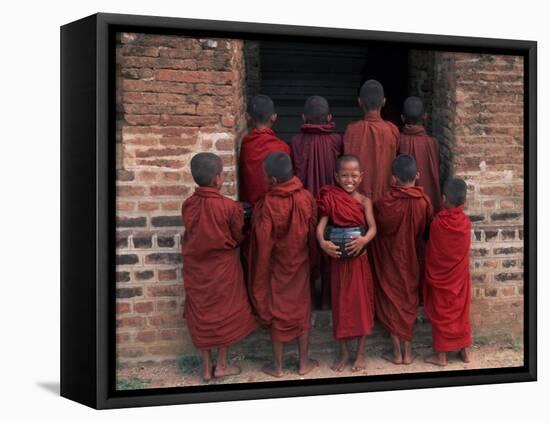 Young Monks in Red Robes with Alms Woks, Myanmar-Keren Su-Framed Premier Image Canvas