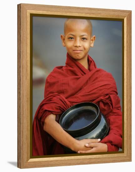 Young Myanmar Buddhist Monk Smiles Broadly as He Waits for Donations Early on a Yangon Street-null-Framed Premier Image Canvas