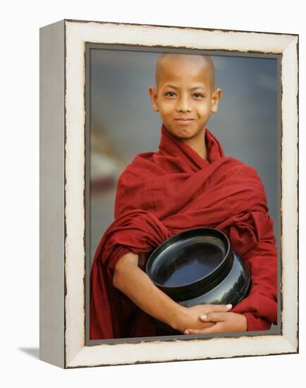 Young Myanmar Buddhist Monk Smiles Broadly as He Waits for Donations Early on a Yangon Street-null-Framed Premier Image Canvas