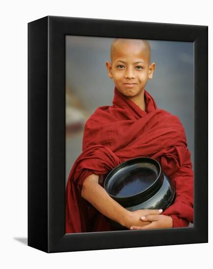 Young Myanmar Buddhist Monk Smiles Broadly as He Waits for Donations Early on a Yangon Street-null-Framed Premier Image Canvas
