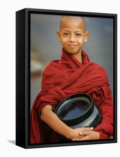 Young Myanmar Buddhist Monk Smiles Broadly as He Waits for Donations Early on a Yangon Street-null-Framed Premier Image Canvas