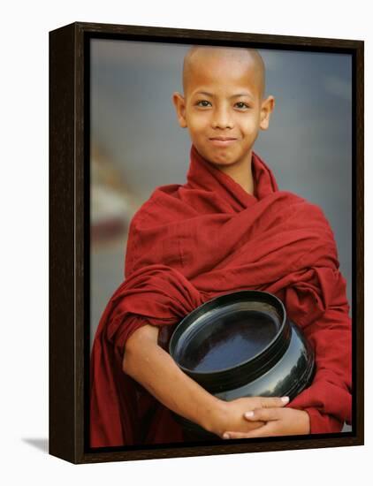 Young Myanmar Buddhist Monk Smiles Broadly as He Waits for Donations Early on a Yangon Street-null-Framed Premier Image Canvas