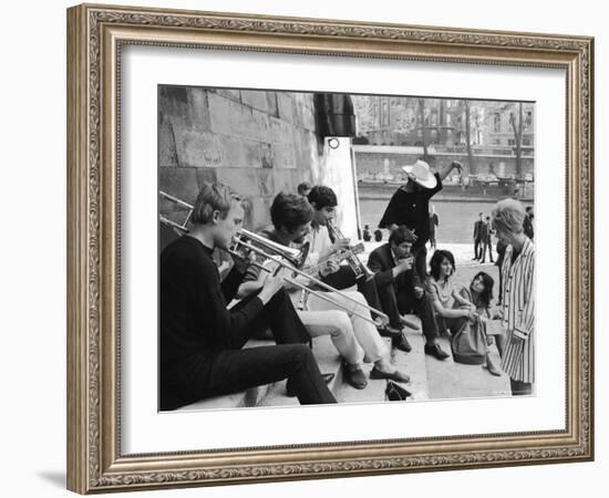 Young Parisian Musicians Enjoying an Impromptu Outdoor Concert on the Banks of the Seine River-Alfred Eisenstaedt-Framed Photographic Print