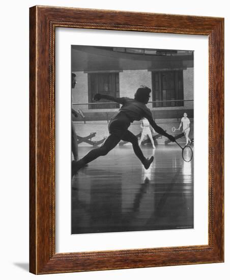 Young People Enjoying a Game of Badminton Inside of a Y.M.C.A-Ralph Crane-Framed Photographic Print