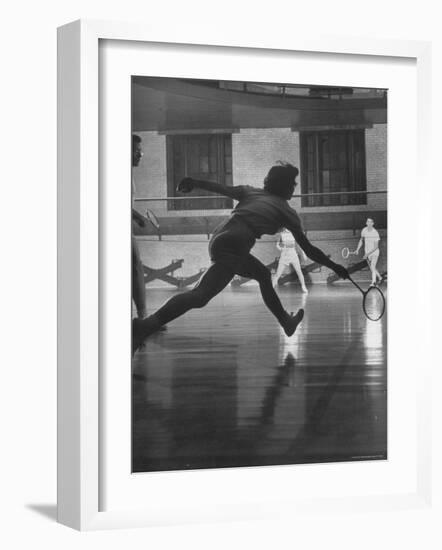 Young People Enjoying a Game of Badminton Inside of a Y.M.C.A-Ralph Crane-Framed Photographic Print