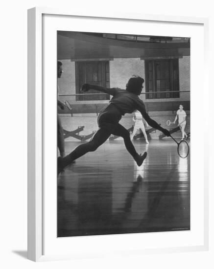 Young People Enjoying a Game of Badminton Inside of a Y.M.C.A-Ralph Crane-Framed Photographic Print