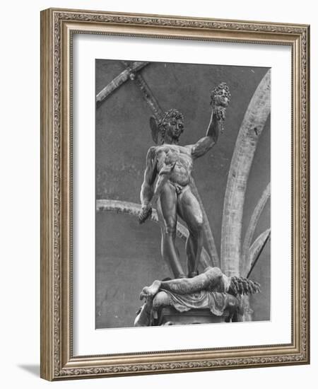 Young Perseus Holding the Decapitated Gorgon Head of Medusa, Standing over Her Body-Carl Mydans-Framed Photographic Print