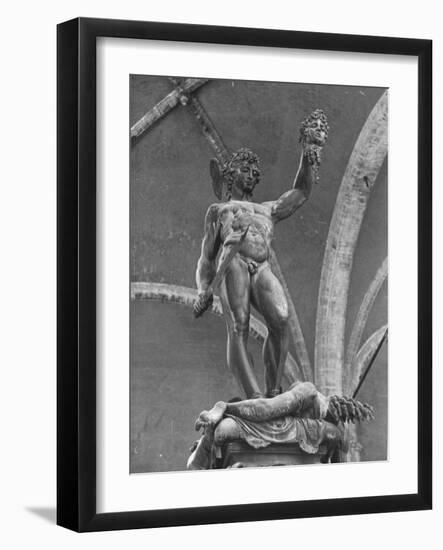 Young Perseus Holding the Decapitated Gorgon Head of Medusa, Standing over Her Body-Carl Mydans-Framed Photographic Print