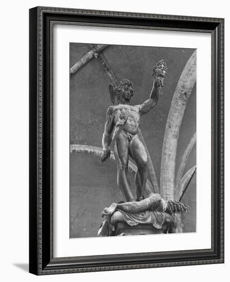 Young Perseus Holding the Decapitated Gorgon Head of Medusa, Standing over Her Body-Carl Mydans-Framed Photographic Print