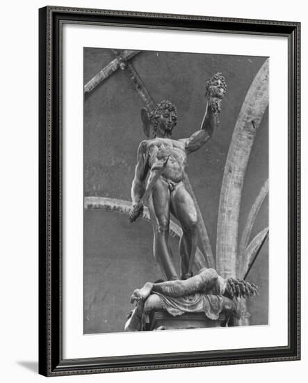 Young Perseus Holding the Decapitated Gorgon Head of Medusa, Standing over Her Body-Carl Mydans-Framed Photographic Print