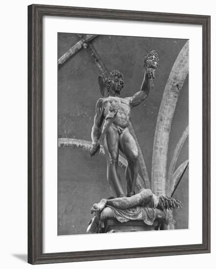 Young Perseus Holding the Decapitated Gorgon Head of Medusa, Standing over Her Body-Carl Mydans-Framed Photographic Print