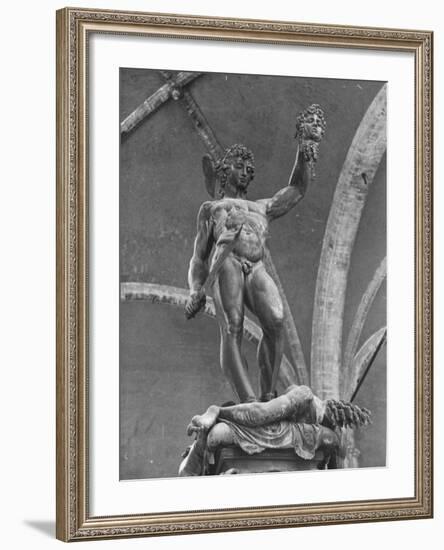 Young Perseus Holding the Decapitated Gorgon Head of Medusa, Standing over Her Body-Carl Mydans-Framed Photographic Print