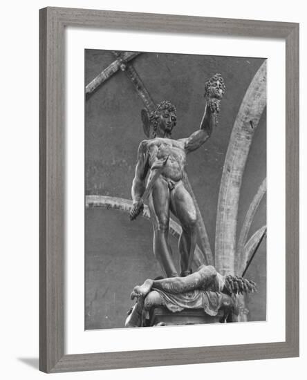 Young Perseus Holding the Decapitated Gorgon Head of Medusa, Standing over Her Body-Carl Mydans-Framed Photographic Print