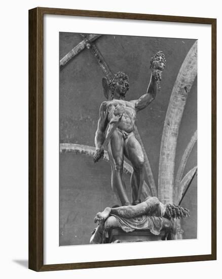 Young Perseus Holding the Decapitated Gorgon Head of Medusa, Standing over Her Body-Carl Mydans-Framed Photographic Print