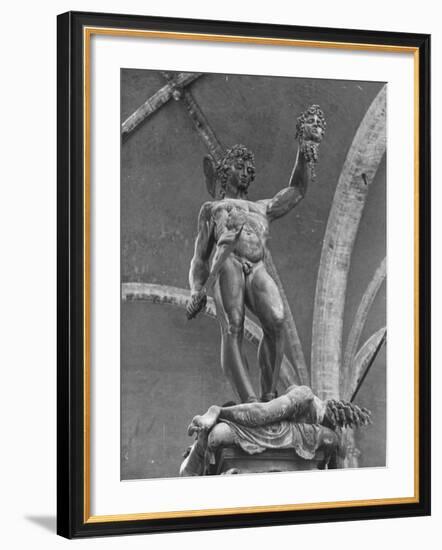 Young Perseus Holding the Decapitated Gorgon Head of Medusa, Standing over Her Body-Carl Mydans-Framed Photographic Print