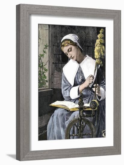 Young Puritan Woman Reading While Spinning at Her Wheel-null-Framed Giclee Print