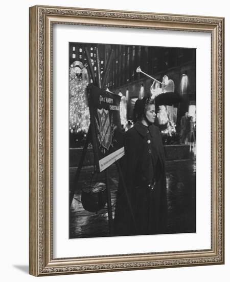 Young Salvation Army Volunteer Soliciting Christmas Time Contributions at Rockefeller Center-Peter Stackpole-Framed Photographic Print