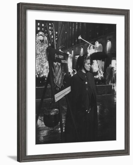 Young Salvation Army Volunteer Soliciting Christmas Time Contributions at Rockefeller Center-Peter Stackpole-Framed Photographic Print