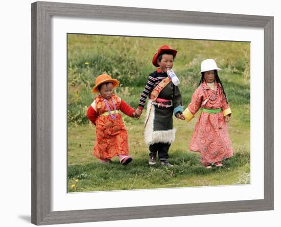 Young Tibetan Children Walk Hand in Hand Near Qinghai Lake-null-Framed Photographic Print