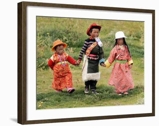 Young Tibetan Children Walk Hand in Hand Near Qinghai Lake-null-Framed Photographic Print